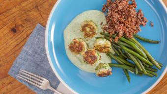 Chimichurri Meatballs  with  Garlic  Green  Beans,  Herby  Yogurt,  and  Red  Quinoa