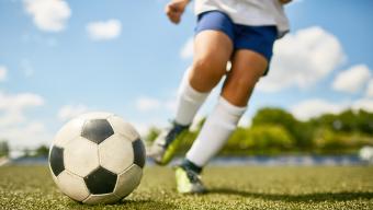 Kid Playing Soccer