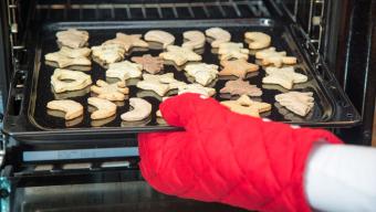 taking cookies out of the oven