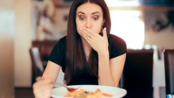 woman eating bad food