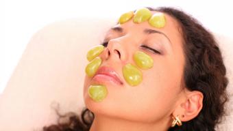 grapes on face