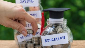 jar labeled education filled with coins