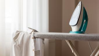 ironing board with iron and shirt