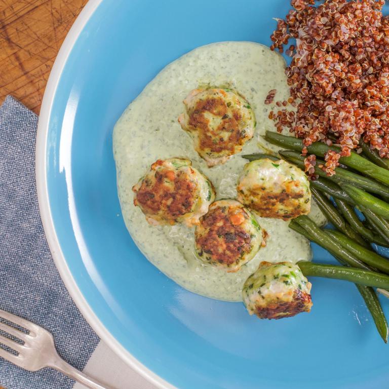Chimichurri Meatballs  with  Garlic  Green  Beans,  Herby  Yogurt,  and  Red  Quinoa