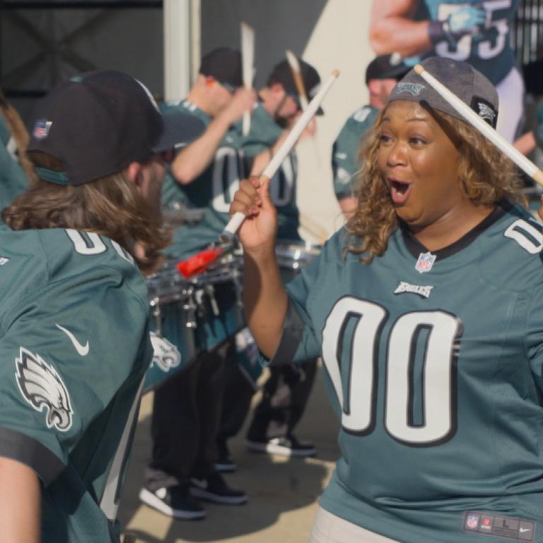 Sunny Anderson with the Eagles' Drumline