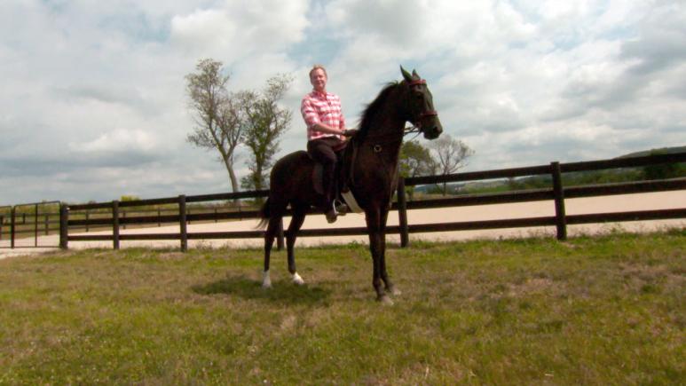 Carson Kressley riding a horse